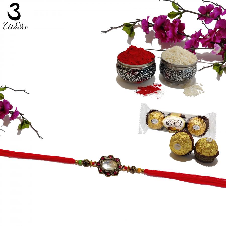 Oval Gemstone Rakhi Surrounded with Beautiful Colored Beads + Roli & Chaval Oval Gemstone Rakhi Surrounded with Beautiful Colored Beads + Roli & Chaval