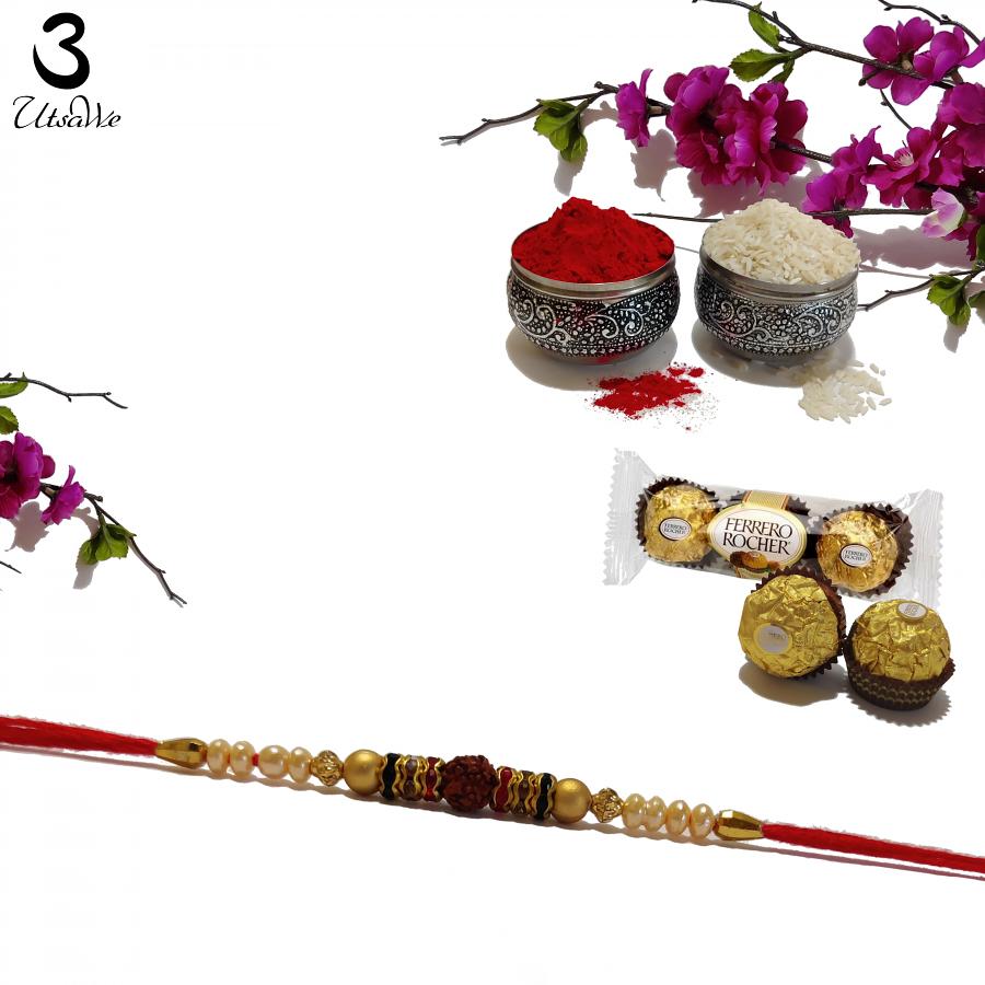 Traditional RAKHI Crafted in Gold W/ Rudraksha & beads + Roli & Chaval Traditional RAKHI Crafted in Gold W/ Rudraksha & beads + Roli & Chaval