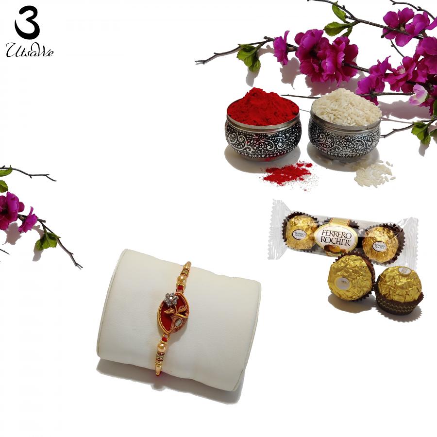 Blissful Rakhi W/ Ruby Like Stone Surrounded W/ Diamonds + Roli & Chaval  
