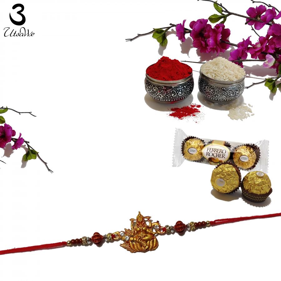Shubh Laxmi Ji Rakhi In Gold with Divine Blessings + Roli & Chaval Shubh Laxmi Ji Rakhi In Gold with Divine Blessings + Roli & Chaval