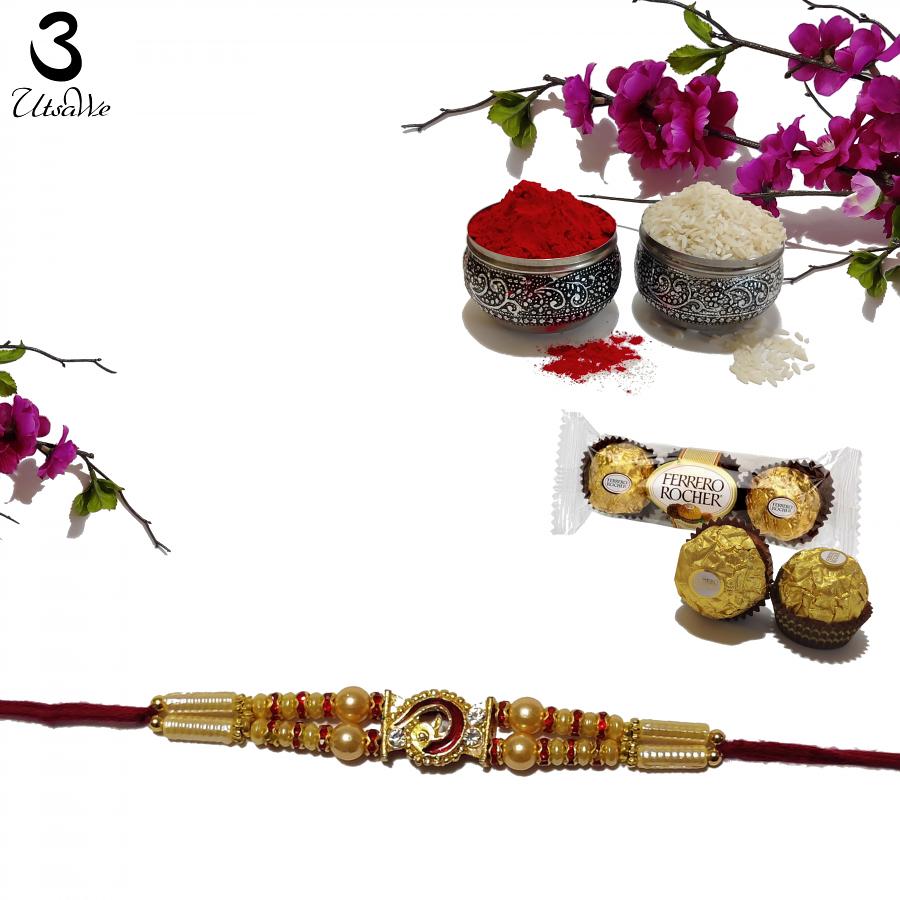 Eye-catchy Golden Mayuri Rakhi W/ Pearls and Diamonds + Roli & Chaval
