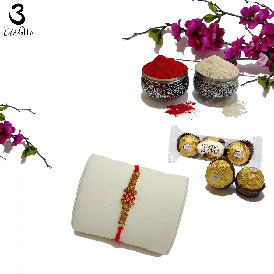 Delicate Rakhi Enhanced W/ Rubies & Mahogany Diamonds + Roli & Chaval Delicate Rakhi Enhanced W/ Rubies & Mahogany Diamonds + Roli & Chaval