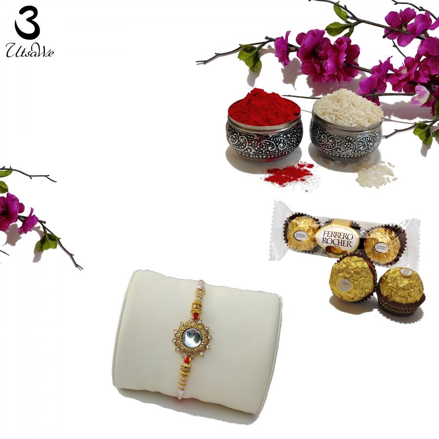 Crystal Rakhi Embraced by Golden Blossom and Royal Design + Roli & Chaval