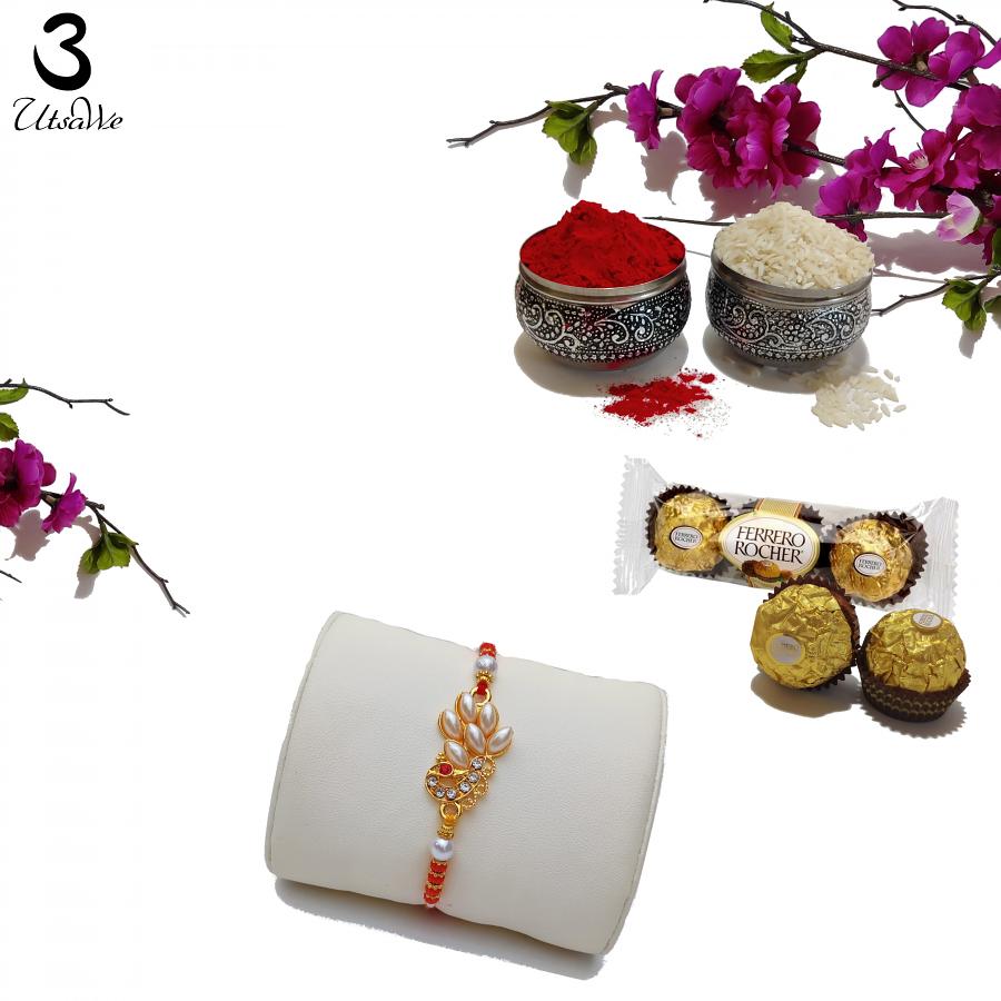 Designer Peacock Rakhi with Peals and Scarlet Beads + Roli & Chaval