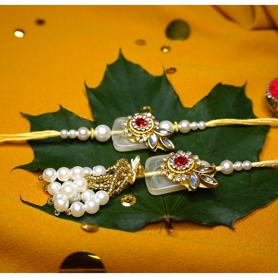 Beautiful White Stone Kundan Bhaiya Bhabhi Rakhi With a Ruby + Roli/Chaval