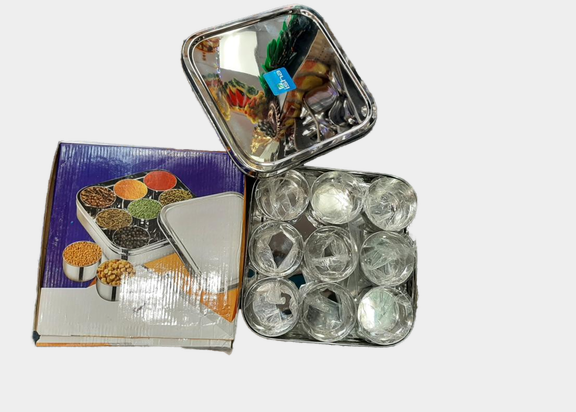 Masala Dabba / Spice Box Stainless Steel with 9 Compartment & 1 Spoons Masala Dabba / Spice Box Stainless Steel with 9 Compartment & 1 Spoons