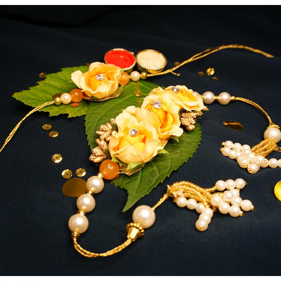 Stunning Royal Lumba Bhaiya Bhabhi Rakhi in Flowers + Roli & Chaval Stunning Royal Lumba Bhaiya Bhabhi Rakhi in Flowers + Roli & Chaval