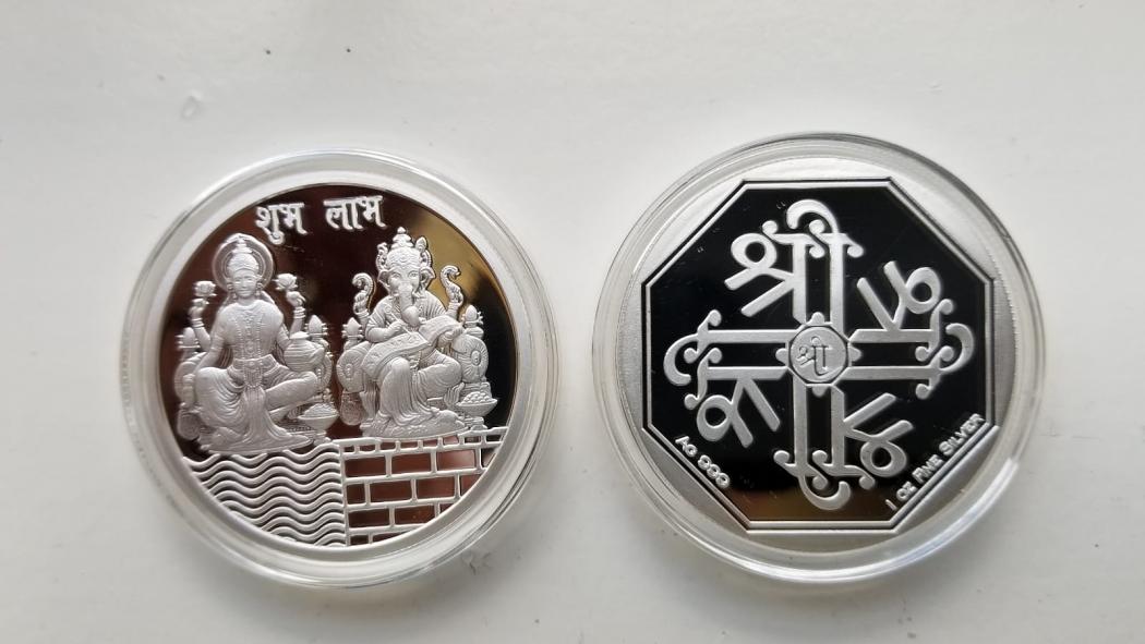 Ganesh Lakshmi Inscribed Pure .999 Silver Coins (1 Oz / 31.1 grams) Ganesh Lakshmi Inscribed Pure .999 Silver Coins (1 Oz / 31.1 grams)