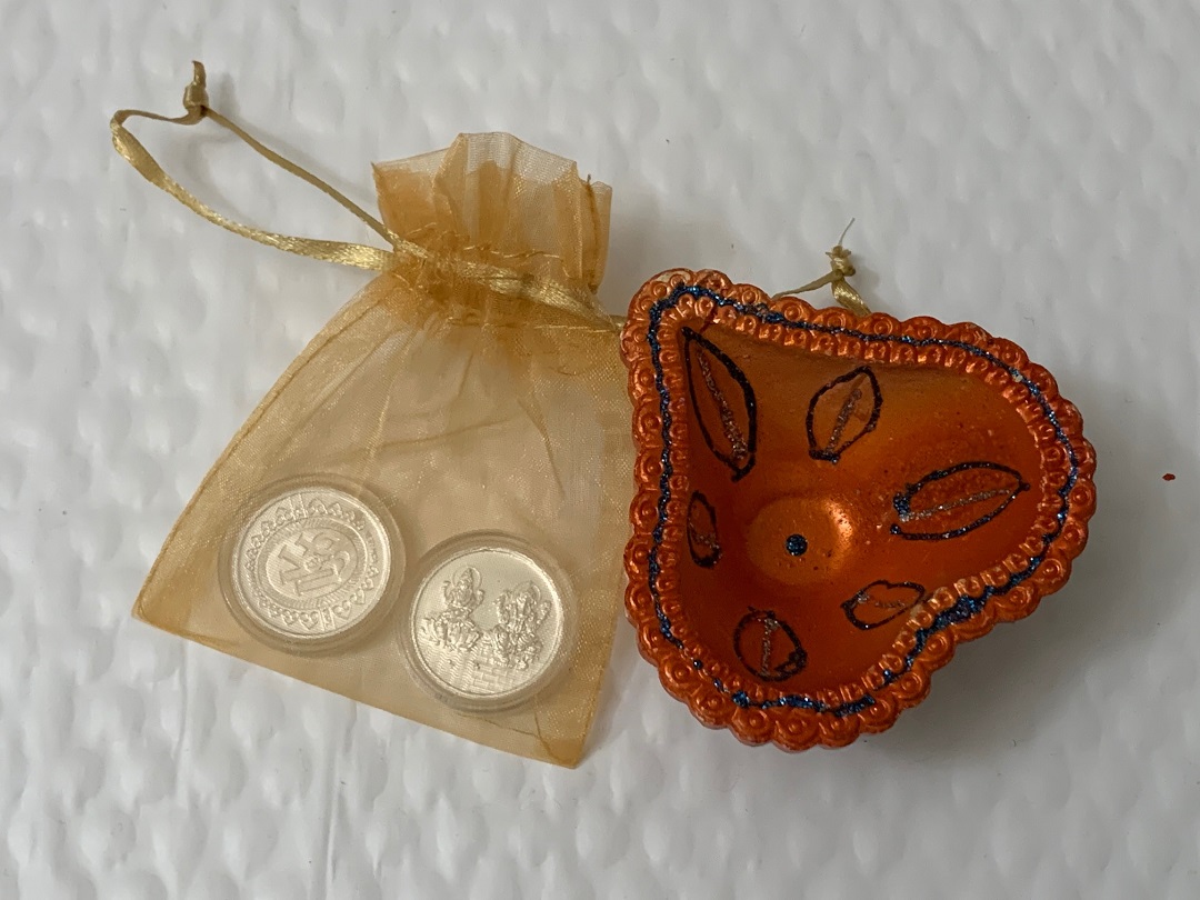 Diwali Gift Hamper - 5g X 2 Pure Silver Coins & a Fancy Clay Diya Diwali Gift Hamper - 5g X 2 Pure Silver Coins & a Fancy Clay Diya