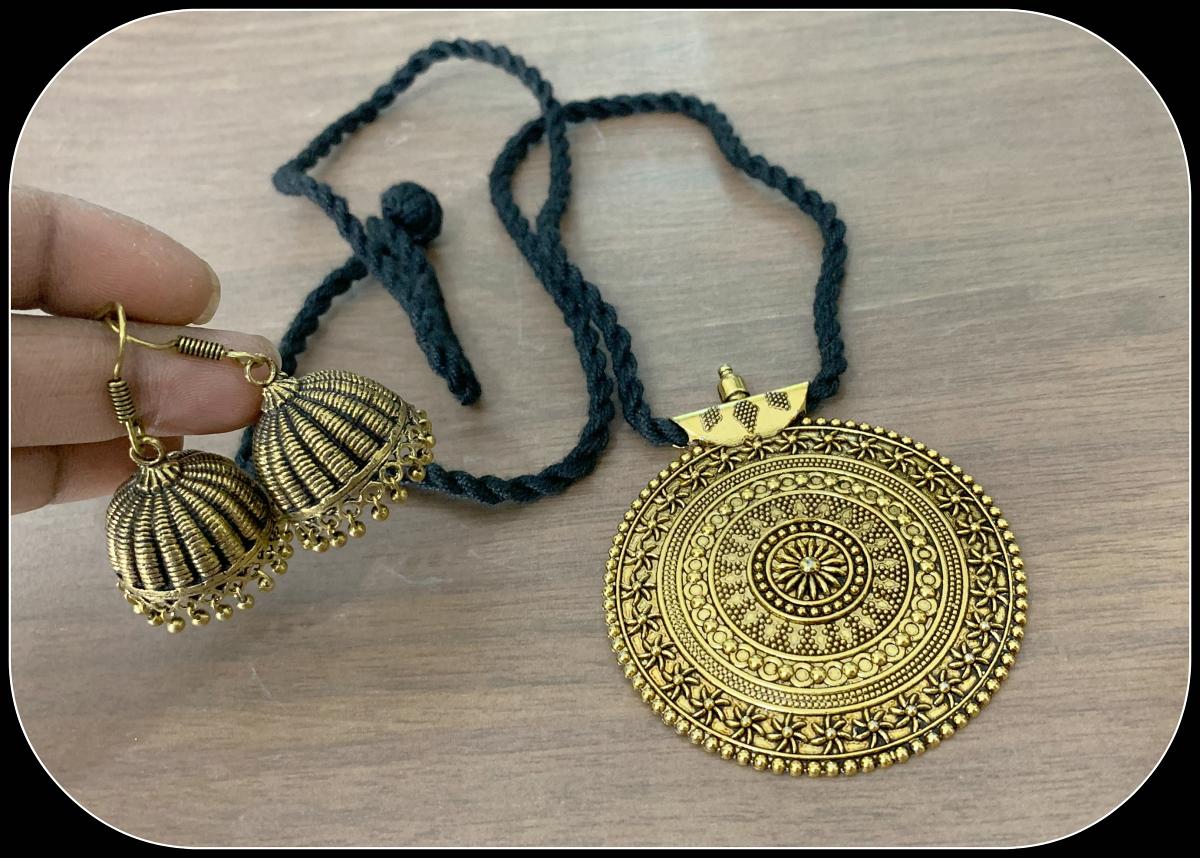 Big Round Designer Oxidised Golden pendant with Hanging Golden Jhumkas!!!!