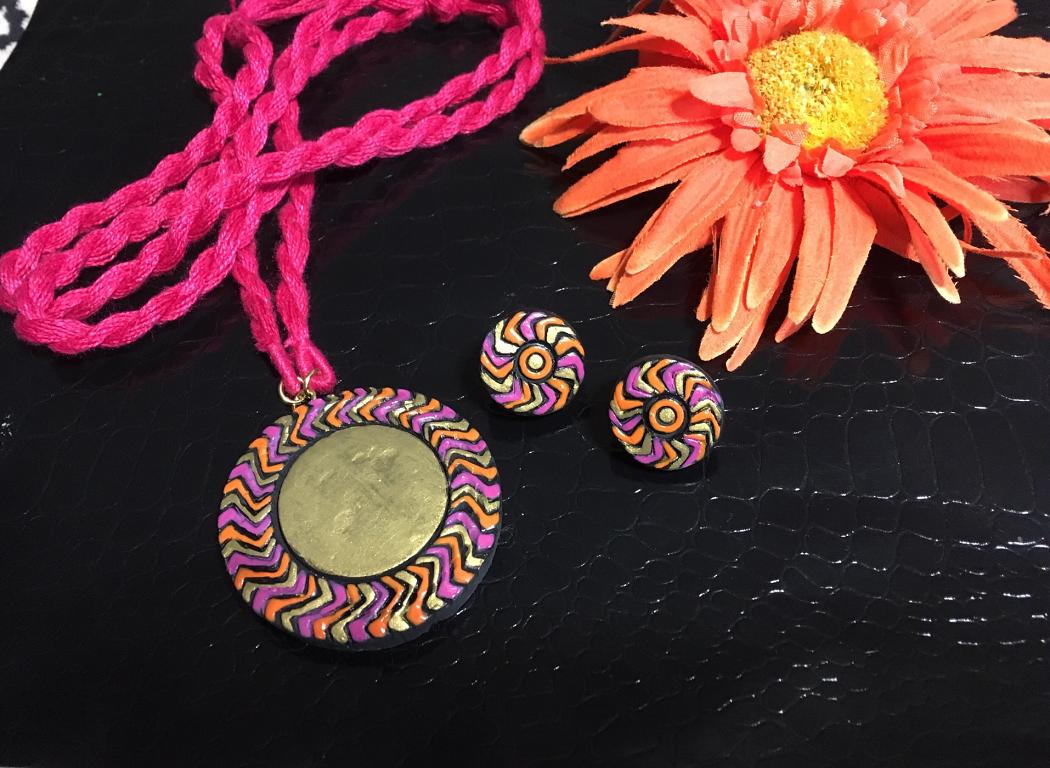 Pink Orange and Gold Zig Zag Pendant in Long Cotton Thread Adjustable rope Pink Orange and Gold Zig Zag Pendant in Long Cotton Thread Adjustable rope