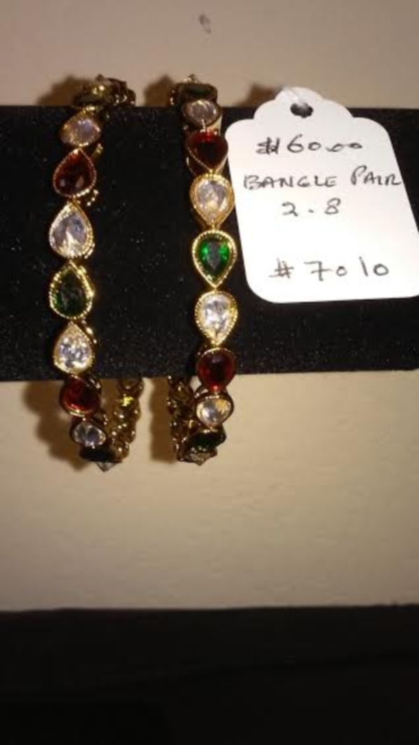 Beautiful Golden Bangles with Multi Color Stones Beautiful Golden Bangles with Multi Color Stones
