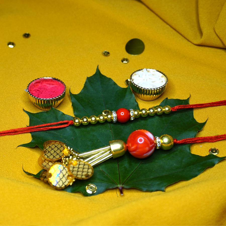 Simple And Classy Red Bead Couple Rakhi + Roli & Chaval