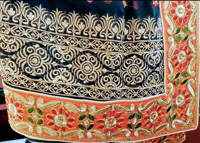 Black  chiffon saree with contrasting orange border
