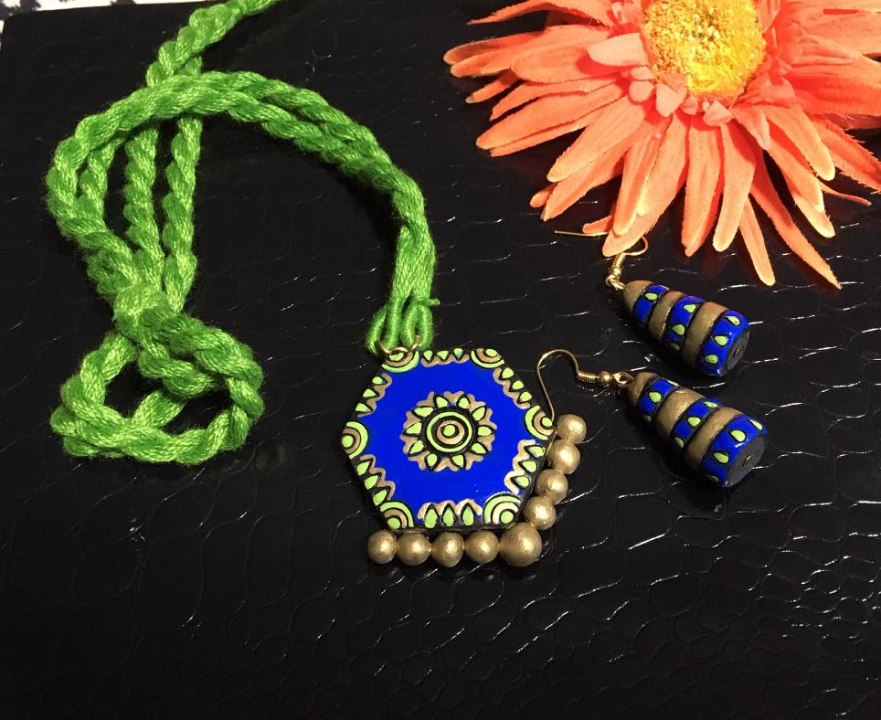 Green and Blue Terracotta pendant set in a long rope with jhumkas!!!! Green and Blue Terracotta pendant set in a long rope with jhumkas!!!!