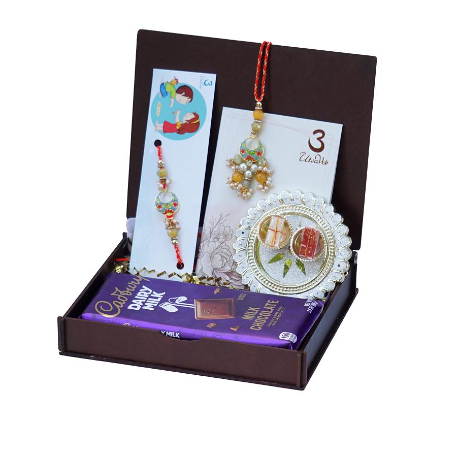 UtsaWe GIFT HAMPER - Mina Lumba Rakhi With Polished Crystal Tassel UtsaWe GIFT HAMPER - Mina Lumba Rakhi With Polished Crystal Tassel