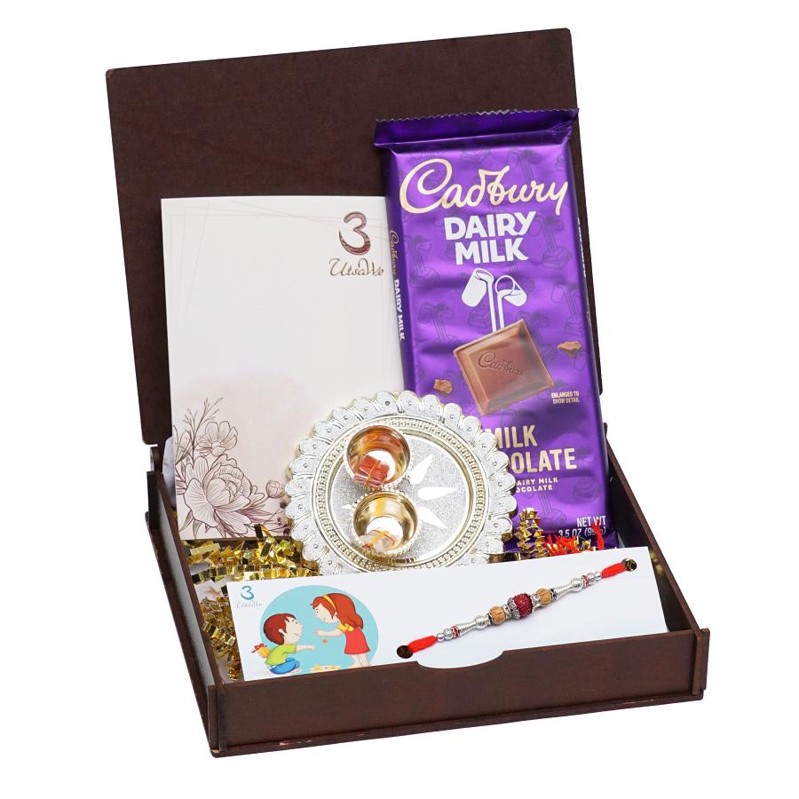 UtsaWe GIFT HAMPER - Elegant Rudraksha Rakhi With Handcrafted Ornaments UtsaWe GIFT HAMPER - Elegant Rudraksha Rakhi With Handcrafted Ornaments