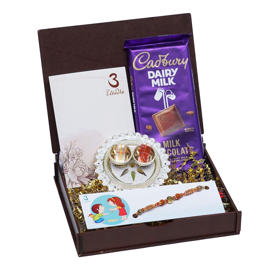 UtsaWe GIFT HAMPER - Ganesh Ji Rakhi With Rudraksha Beads UtsaWe GIFT HAMPER - Ganesh Ji Rakhi With Rudraksha Beads