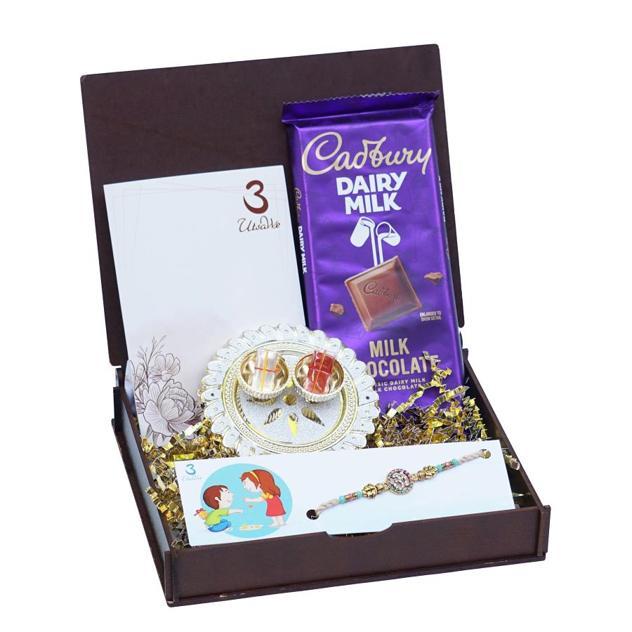 UtsaWe GIFT HAMPER - Adorable OM Rakhi with Cute Little Leaves on Side UtsaWe GIFT HAMPER - Adorable OM Rakhi with Cute Little Leaves on Side