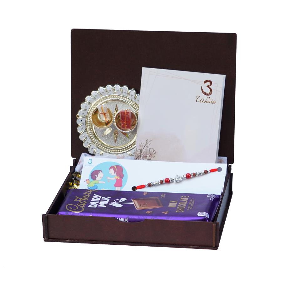 UtsaWe GIFT HAMPER - Adorable Silver laughing Buddha Rakhi | Designer Rakhi UtsaWe GIFT HAMPER - Adorable Silver laughing Buddha Rakhi | Designer Rakhi