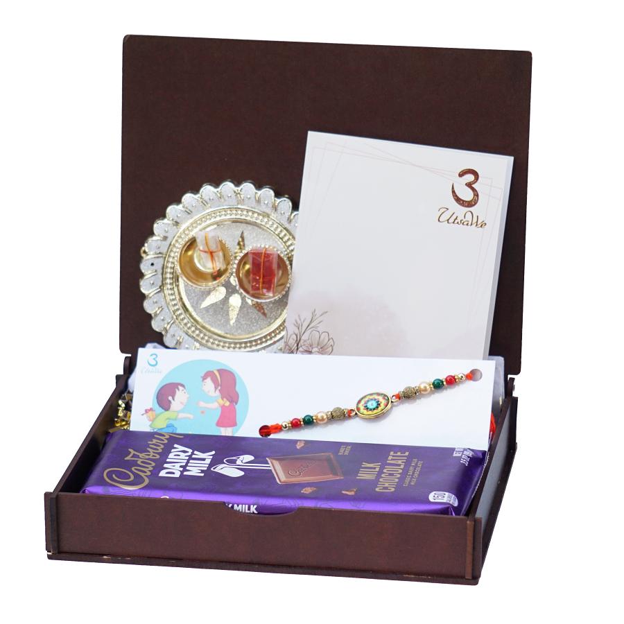 UtsaWe GIFT HAMPER - Antique Rajwadi Rakhi Surrounded By Exquisite Beads UtsaWe GIFT HAMPER - Antique Rajwadi Rakhi Surrounded By Exquisite Beads