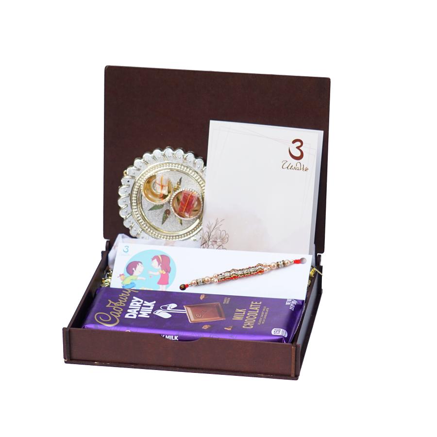 UtsaWe GIFT HAMPER - Equisite Golden Rakhi With Diamonds and Beads