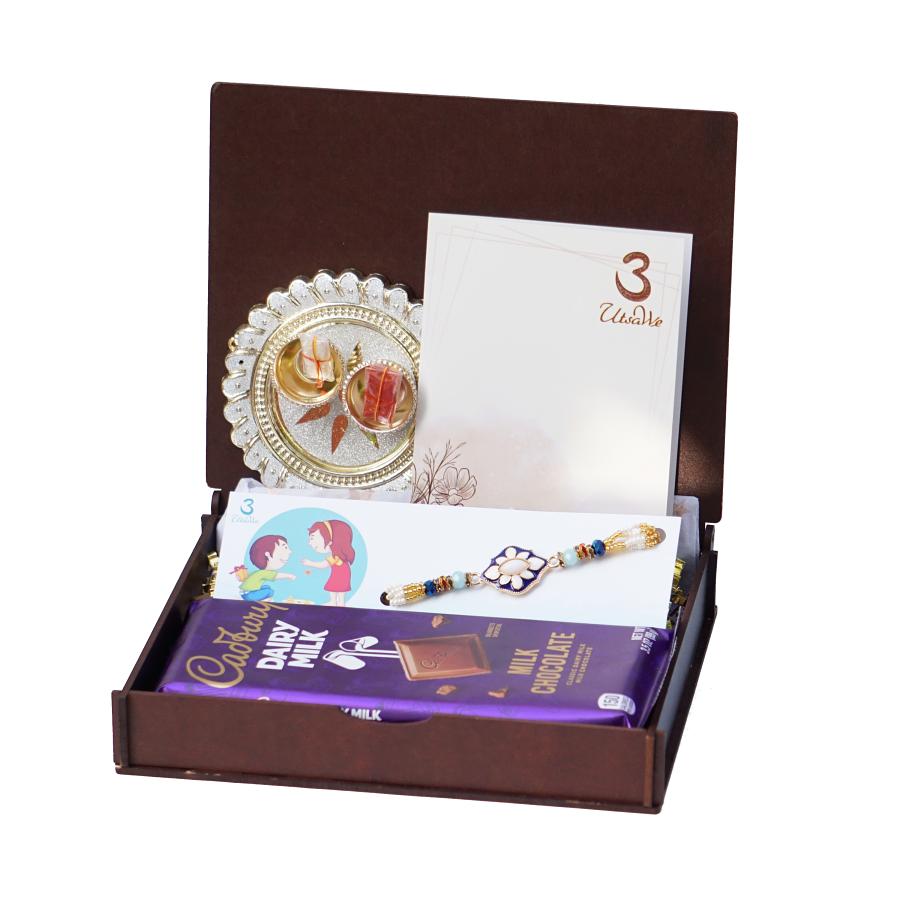 UtsaWe GIFT HAMPER - Auspicious Blue Meena Rakhi Surrounded By Small beads UtsaWe GIFT HAMPER - Auspicious Blue Meena Rakhi Surrounded By Small beads