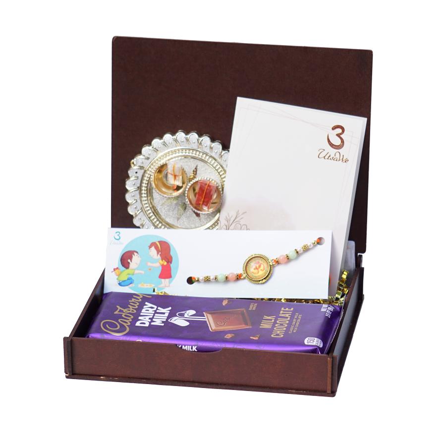 UtsaWe GIFT HAMPER - Affectionate Antique Om Rakhi W/ Beautiful Beads UtsaWe GIFT HAMPER - Affectionate Antique Om Rakhi W/ Beautiful Beads