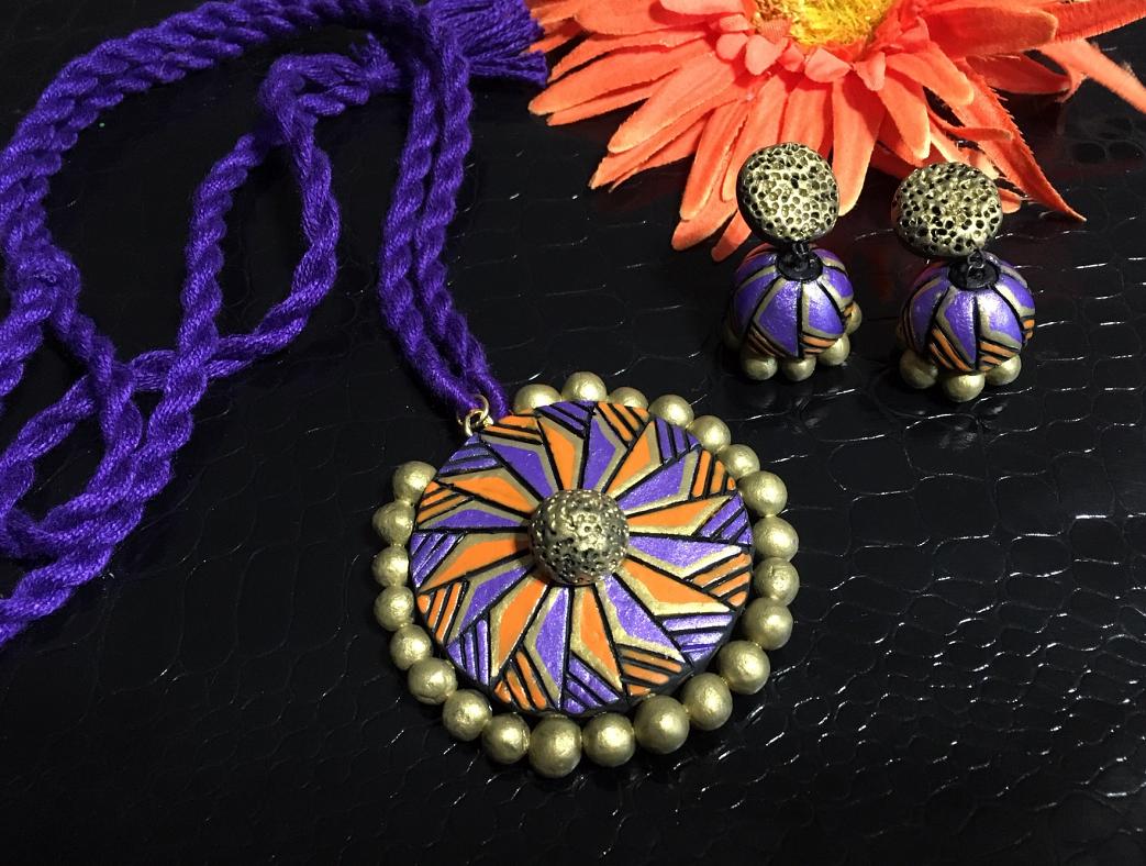 Purple and orange Terracotta pendant and Jhumka in a long thread rope-!!! Purple and orange Terracotta pendant and Jhumka in a long thread rope-!!!