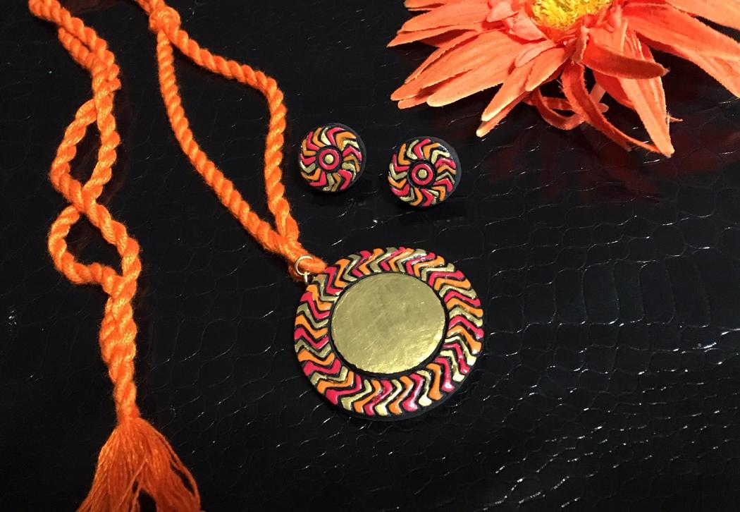 Red and Orange Zig Zag Pendant in Long Cotton Thread Adjustable rope Red and Orange Zig Zag Pendant in Long Cotton Thread Adjustable rope