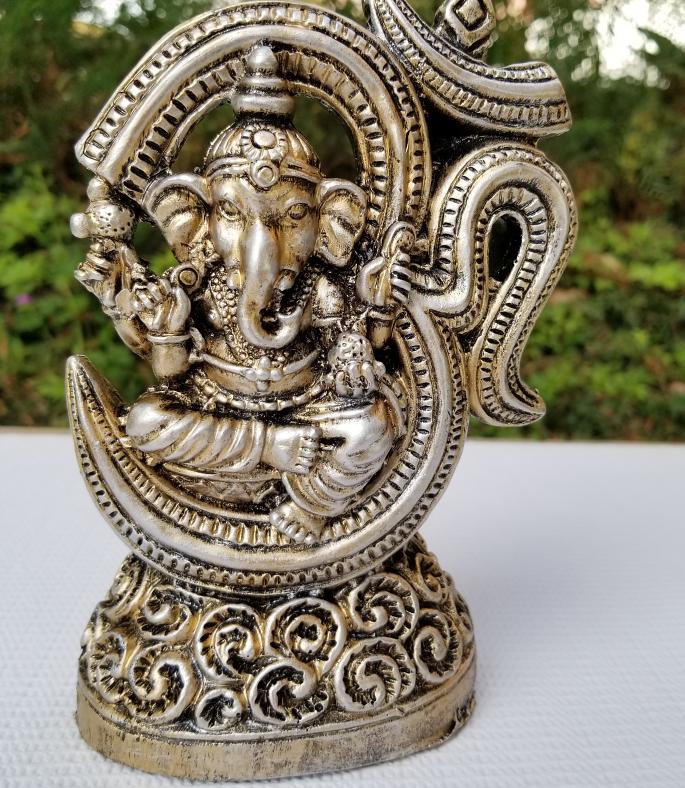 Ganesha Statue Seated in Omnipresent Om in Gold Finish 7"
