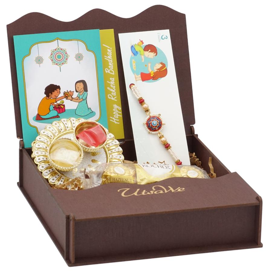 UtsaWe GIFT HAMPER -Designer Meena Rakhi Surrounded By Beautiful White Bead