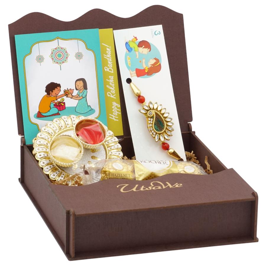 UtsaWe GIFT HAMPER  - Designer Peacock Fearthe Rakhi Surrounded by Kundan