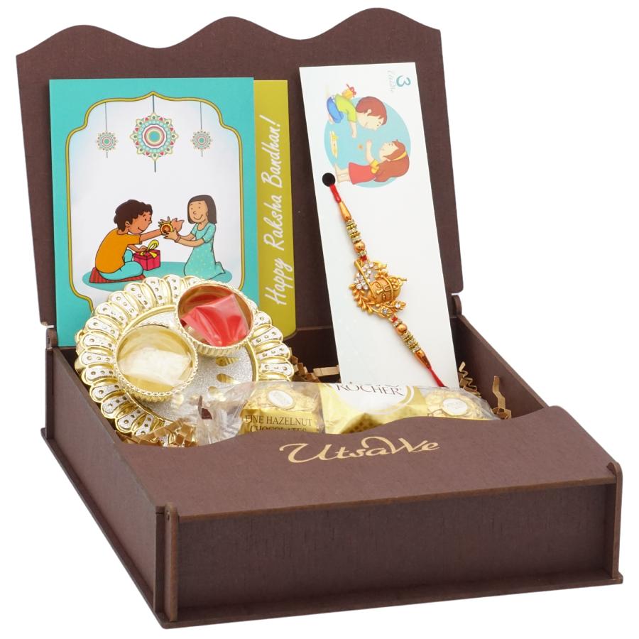 UtsaWe GIFT HAMPER - Handcrafted Krishna Rakhi W/ Polished Crystal Diamonds UtsaWe GIFT HAMPER - Handcrafted Krishna Rakhi W/ Polished Crystal Diamonds