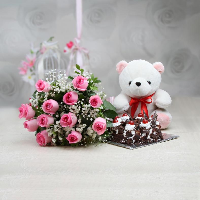 Bunch of 10 Pink Roses & Half Kg Black Forest Cake w/ 12 Inches Teddy Bunch of 10 Pink Roses & Half Kg Black Forest Cake w/ 12 Inches Teddy