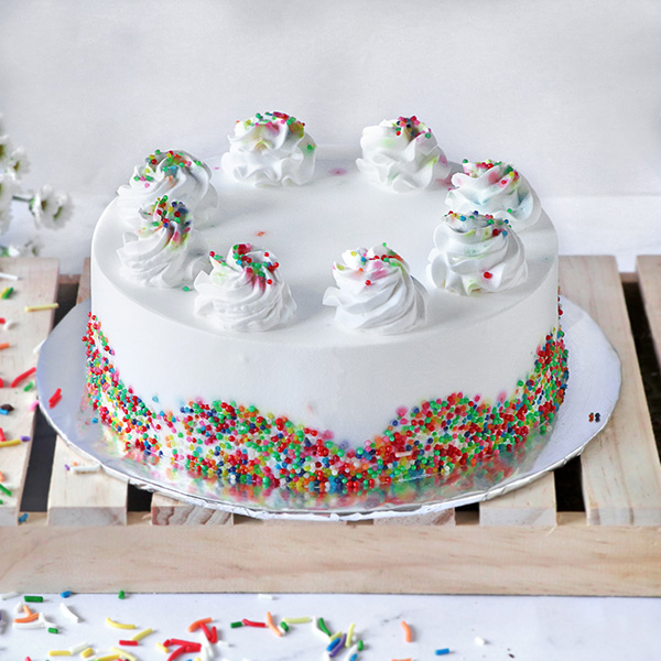 Vanilla Cake With Rainbow Sprinkles Half Kg Buy Cakes Chocolates Online Vanilla Cake With Rainbow Sprinkles Half Kg Buy Cakes Chocolates Online