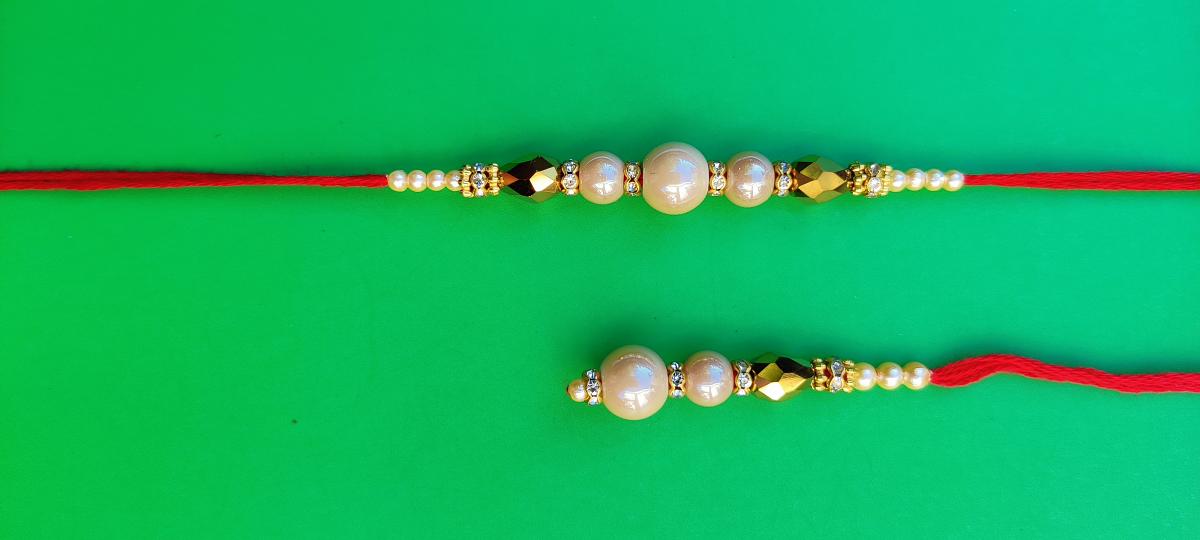 Bhaiya Bhabhi Rakhi W/ Polished Pearls for Rakshabandhan + Roli & Chaval Bhaiya Bhabhi Rakhi W/ Polished Pearls for Rakshabandhan + Roli & Chaval