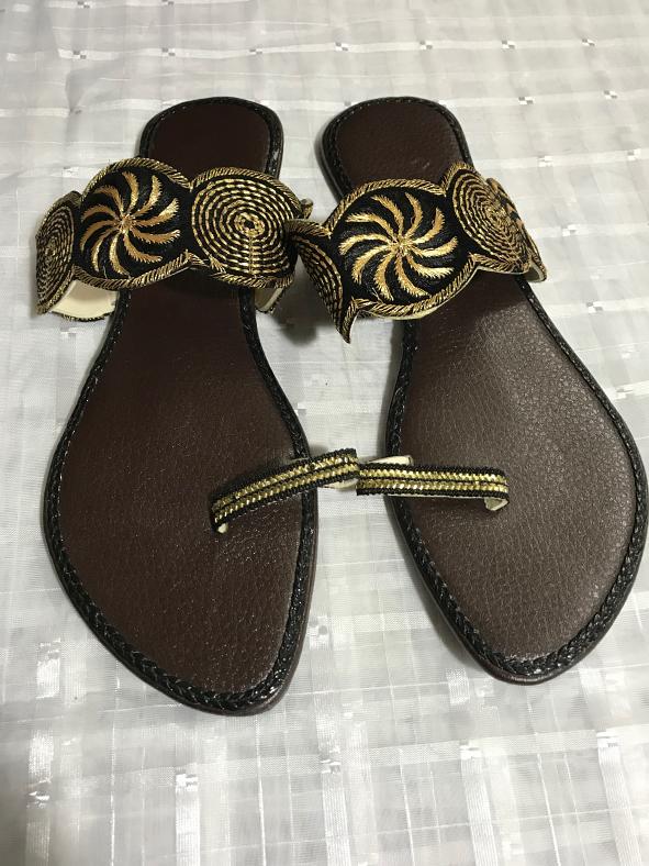 black and gold slippers
