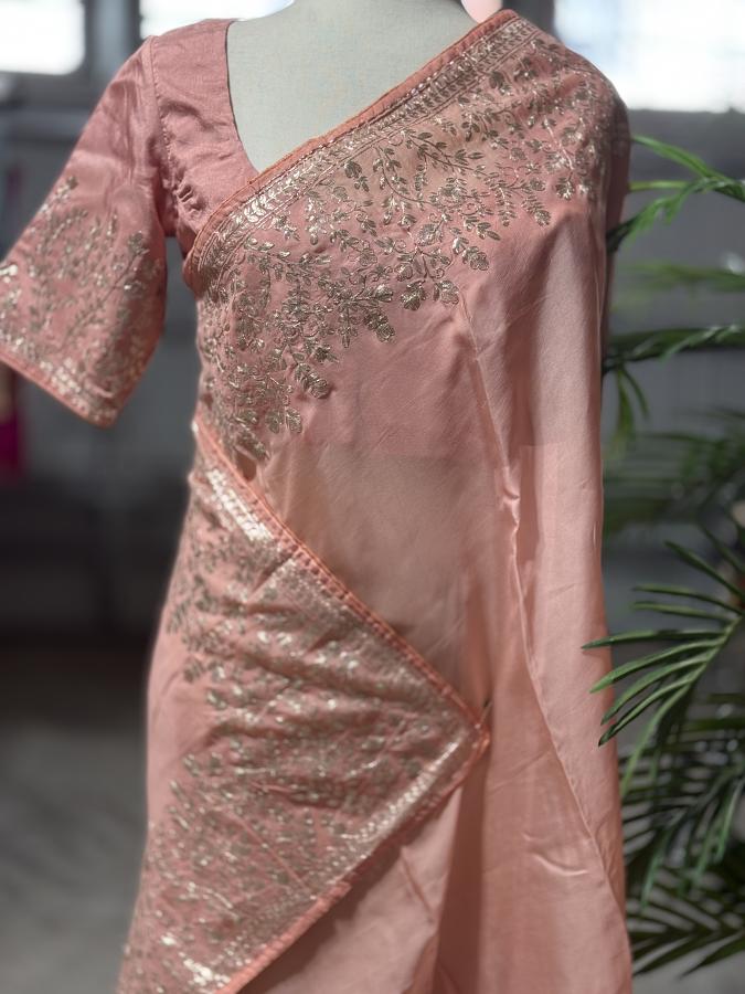 Peach Soft Organza Saree with Intricate Zari Work  Includes stitched blouse