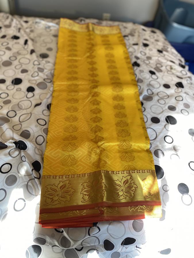 Kancheepuram Festive Yellow Silk Saree Golden Color with Red Border Kancheepuram Festive Yellow Silk Saree Golden Color with Red Border