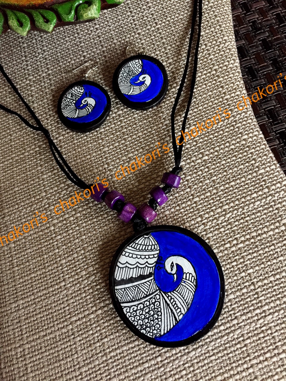 Trendy Peacock pendant  w/earrings- orange & black peacock terracotta set