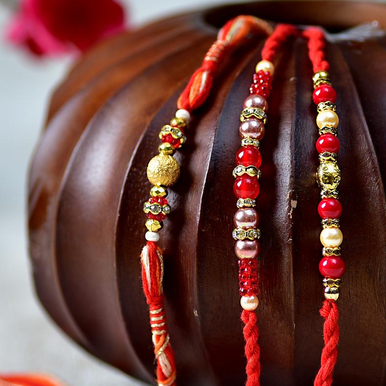 Three Charming Red Beaded Rakhi Bracelets