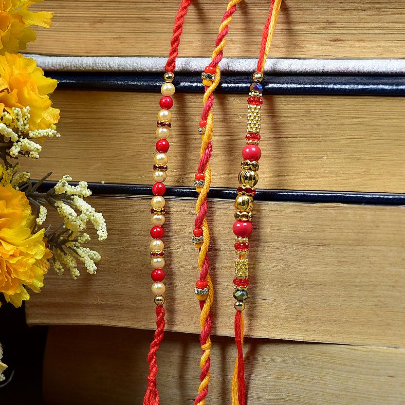 Exclusive Set of 3 Pearl & Stone Studded Rakhi