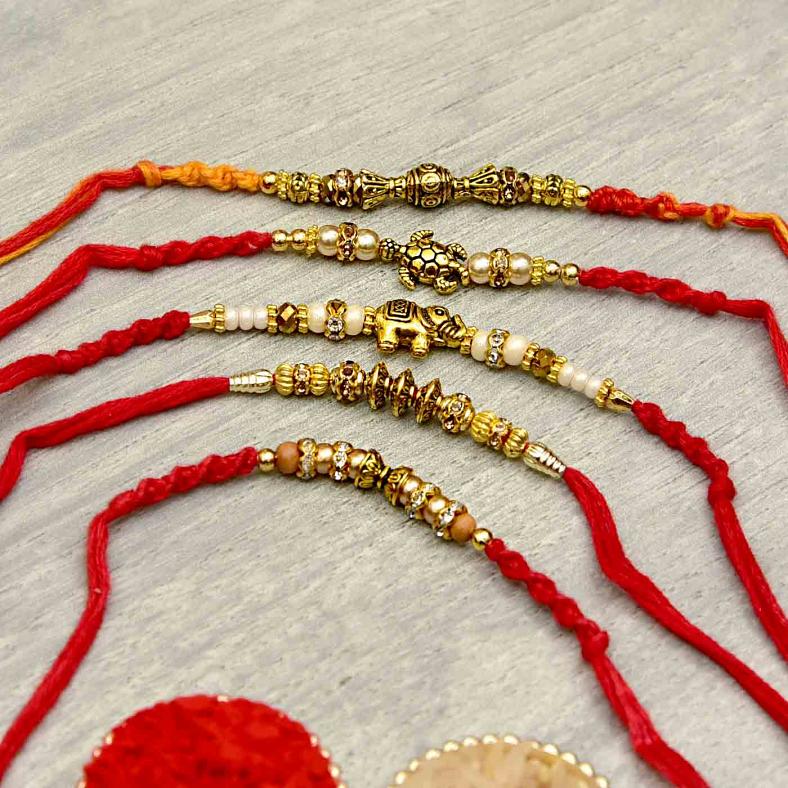 Unique Metalic Dial Set of 5 Rakhi