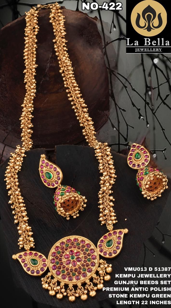 Lovely Kemp Stone Pendant in Long Gold Ghungroos Maala with Kemp Stone Jhum Lovely Kemp Stone Pendant in Long Gold Ghungroos Maala with Kemp Stone Jhum