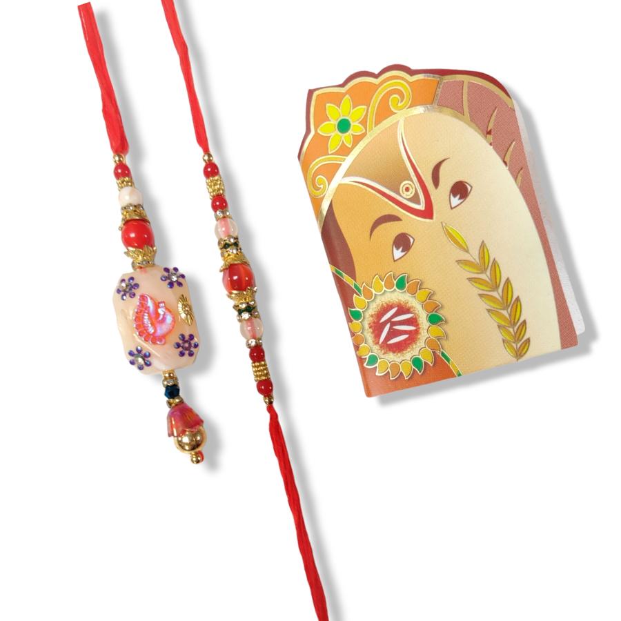 Beautiful Peacock Couple Rakhi With Shiny Beads + Roli & Chaval Beautiful Peacock Couple Rakhi With Shiny Beads + Roli & Chaval