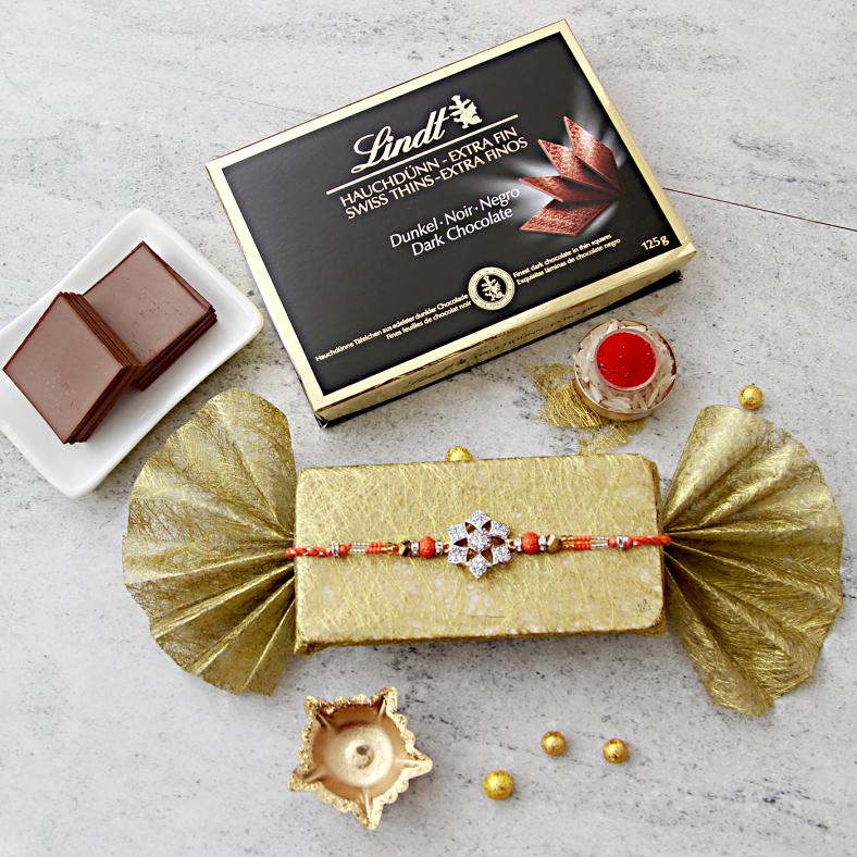 Stylish Cz Rakhi w/ A Box of Lindt Chocolates & Roli-Chawal Kit