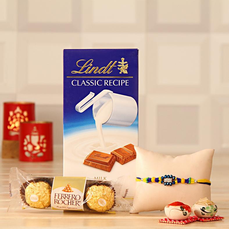 Rakhi w/ A Bar of Lindt Classic Chocolate & Roli-Chawal Kit