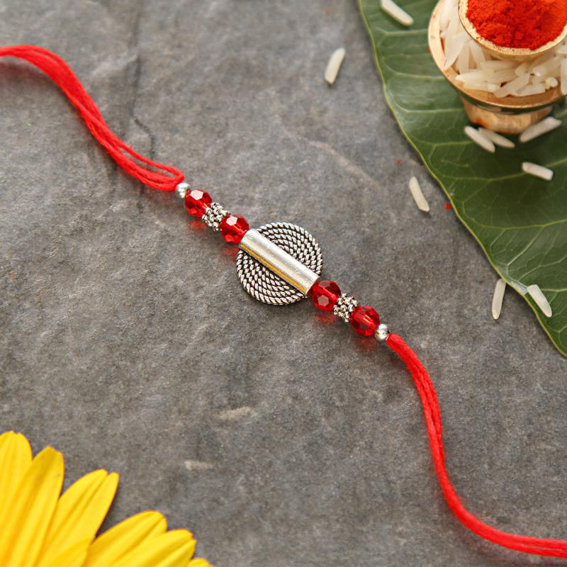 Elegant Metallic Antique Rakhi