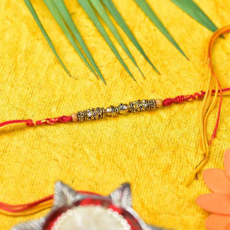 Exclusive Antique Work Thread Rakhi